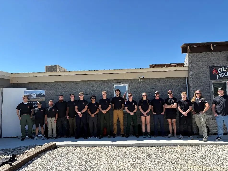 The Outback Firefighting team in front of the Outback building
